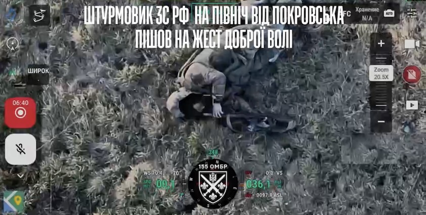 Russian receives direct FPV hit while walking in the open area, immediately grabs his AK and shoots himself